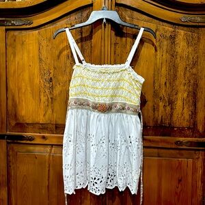 Very pretty adjustable strap smocked top by Free people